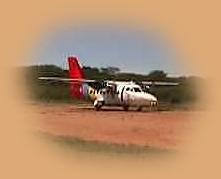 Scheduled plane on an airstrip just outside the Mara.