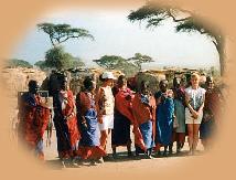 Maasai village - the two girls have been adopted by the tribeswomen.